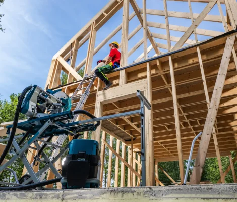 Wooden Skeleton Frame Contractor Taking Short Lunch Break While in the Job